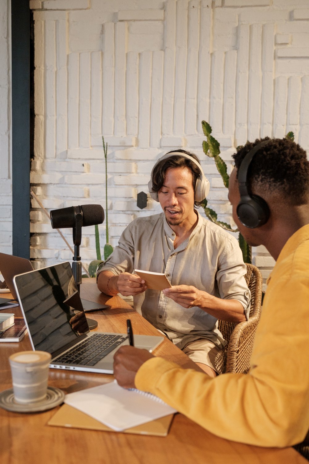 Two Male Podcasters Talking to Each Other